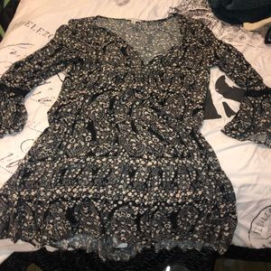 Long-sleeved floral romper